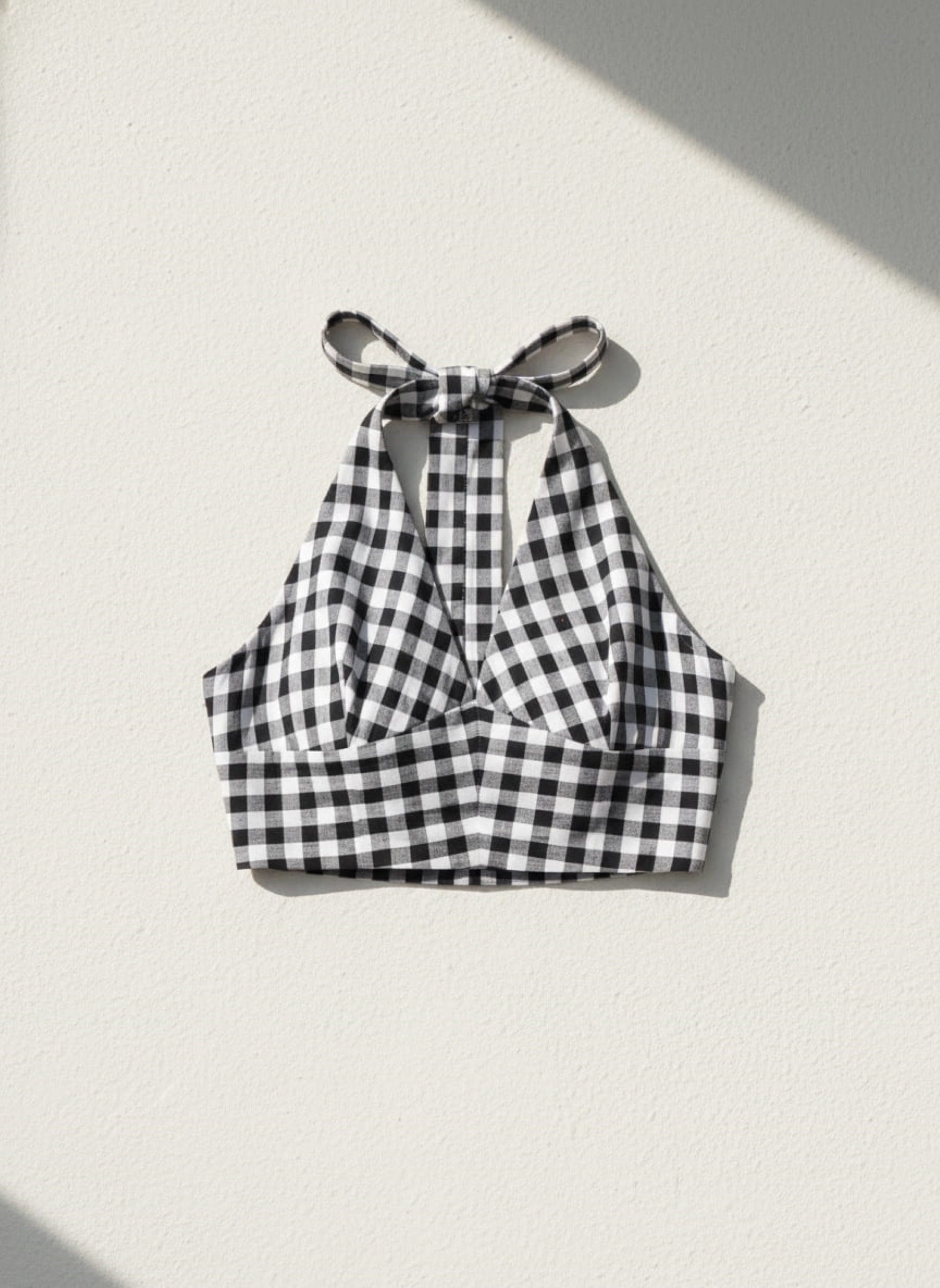halter neck tie up khadi crop top black big checks flat lay